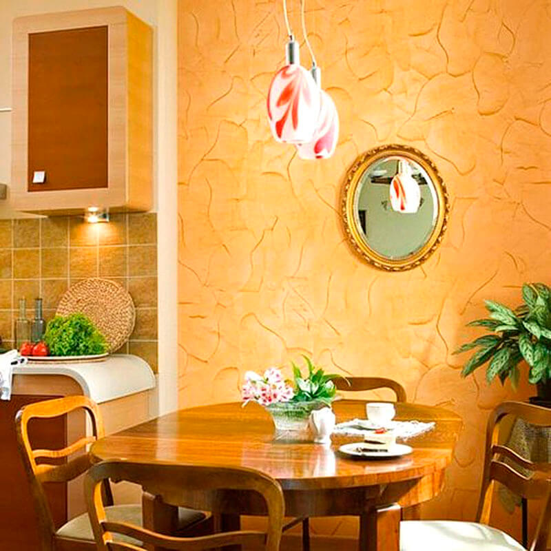 Комбинированное покрытие стен в кухне помогает зонировать помещение
